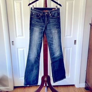 Tory Burch Distressed Boot Cut Jean.